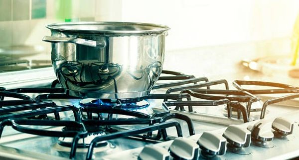 Image of a cooking pot on a propane stove, courtesy istock